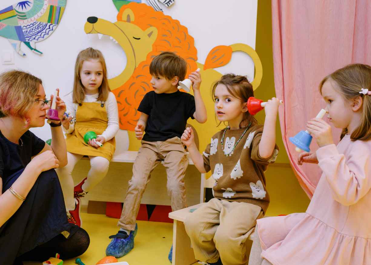 Kinder children working together on a class project