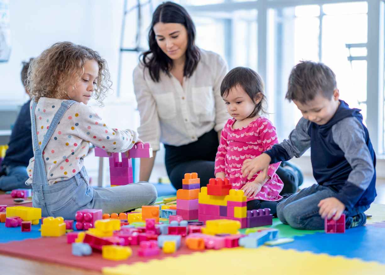 Three-year-olds exploring in the Voyagers room