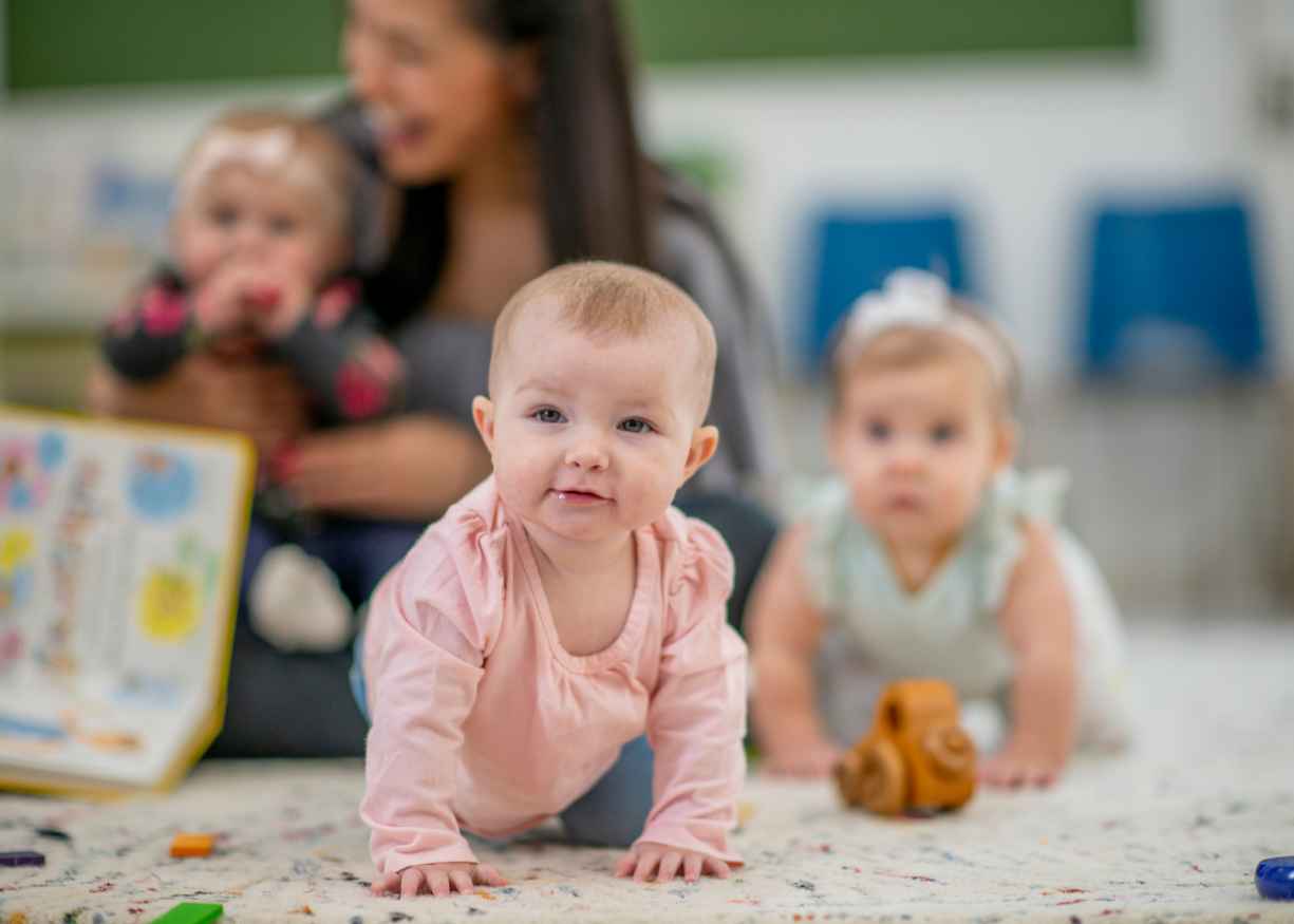 A baby playing in the Discovery room